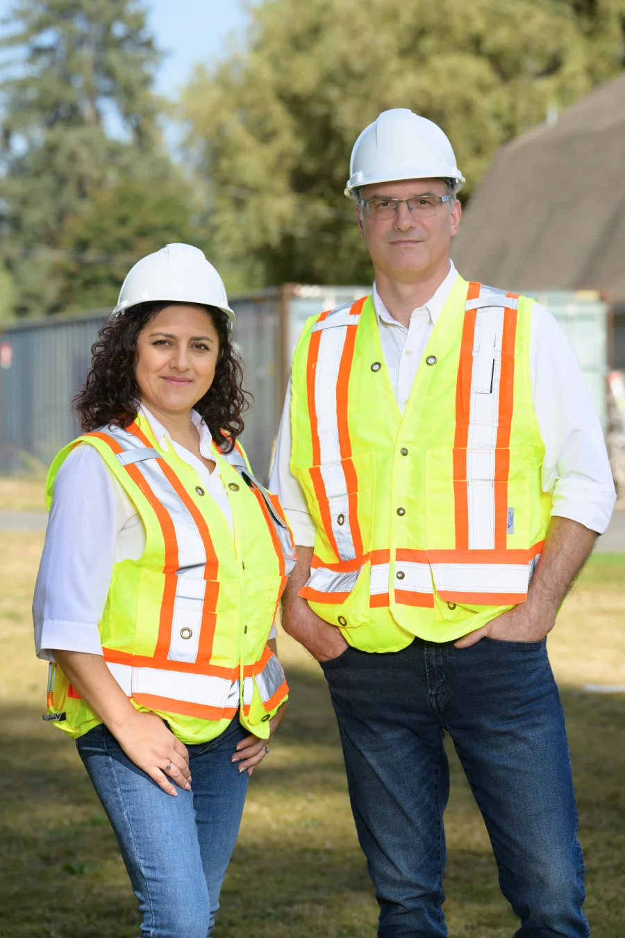 Jacob and Maria Seutter, founders of VisionSure Technologies, wearing hard hats and safety vests